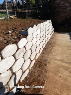 Retainer wall installation.