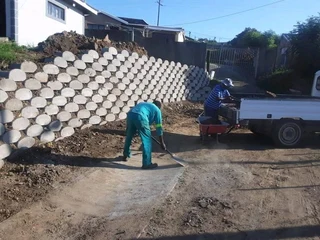 Retainer wall installation.