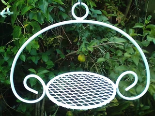 Fjs  Wagon Wheels, Topiaries, Hose Reels, Candelabras, Steel Flowers, Lantern Stands, Bedding Stands