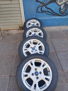 A Set Of Rims And Tyres 15inche Ford Figo And Ford Fiesta Original Mags 4x100 Pcd