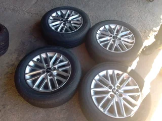A Set of 15inche Rims and Tyres Kia Rio 4x100 Pcd Original mags