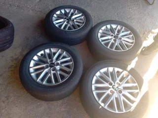 A Set of 15inche Rims and Tyres Kia Rio 4x100 Pcd Original mags
