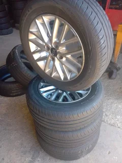 A Set of 15inche Rims and Tyres Kia Rio 4x100 Pcd Original mags