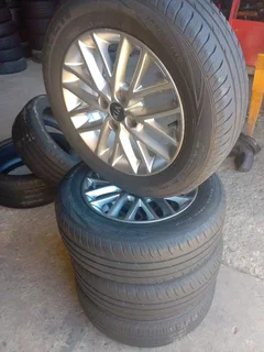 A Set of 15inche Rims and Tyres Kia Rio 4x100 Pcd Original mags