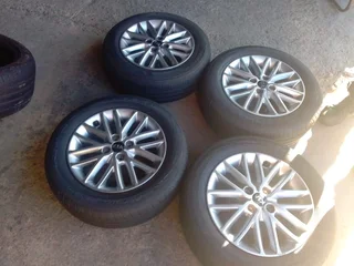A Set of 15inche Rims and Tyres Kia Rio 4x100 Pcd Original mags