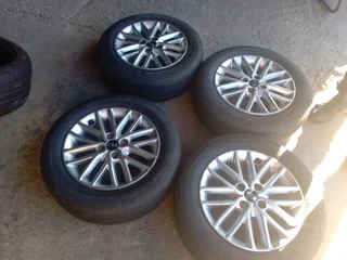 A Set of 15inche Rims and Tyres Kia Rio 4x100 Pcd Original mags