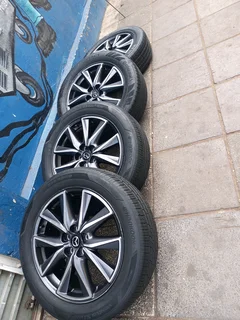 A Set Of 19inche Rims And Tyres Masda Cx5 Original Mags