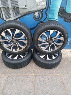 A Set of Rims And TYRES Toyota Starlet and Toyota Yaris 4x100 Pcd