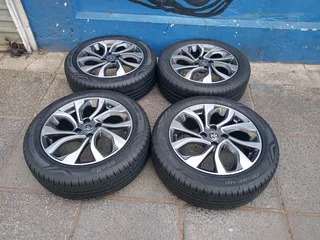 A Set of Rims And TYRES Toyota Starlet and Toyota Yaris 4x100 Pcd
