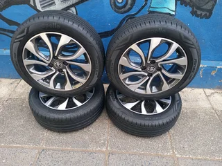 A Set of Rims And TYRES Toyota Starlet and Toyota Yaris 4x100 Pcd