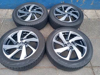 A Set of 16inche Rims And TYRES Toyota Starlet