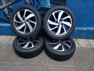 A Set of 16inche Rims And TYRES Toyota Starlet