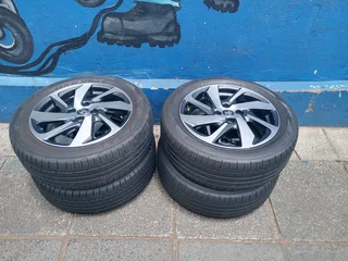 A Set of 16inche Rims And TYRES Toyota Starlet