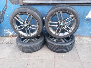 A Set of 18inche Rims And TYRES BMW Original mag 5X112 PCD