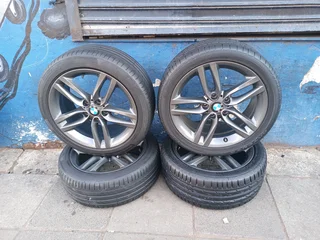 A Set of 18inche Rims And TYRES BMW Original mag 5X112 PCD