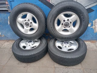 A Set of 16inche Rims And TYRES NISSAN NP300 Original mags
