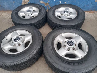 A Set of 16inche Rims And TYRES NISSAN NP300 Original mags
