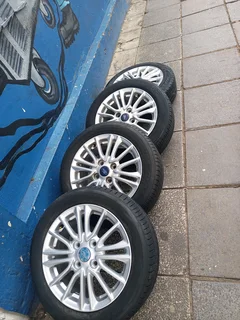 A Set Of Rims And Tyres 15inche Ford Figo And Ford Fiesta Original Mag 4x108 Pcd