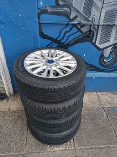 A Set of Rims And TYRES 15inche Ford Figo and Ford Fiesta Original mag 4X108 Pcd