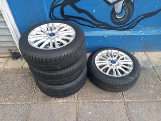 A Set of Rims And TYRES 15inche Ford Figo and Ford Fiesta Original mag 4X108 Pcd