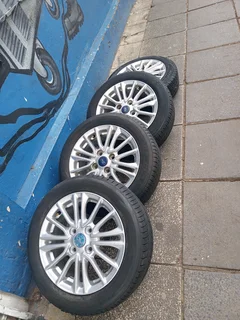 A Set of Rims And TYRES 15inche Ford Figo and Ford Fiesta Original mag 4X108 Pcd