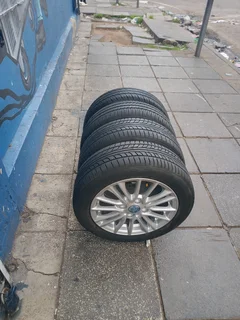 A Set of Rims And TYRES 15inche Ford Figo and Ford Fiesta Original mag 4X108 Pcd