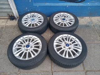 A Set of Rims And TYRES 15inche Ford Figo and Ford Fiesta Original mag 4X108 Pcd