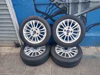 A Set of Rims And TYRES 15inche Ford Figo and Ford Fiesta Original mag 4X108 Pcd