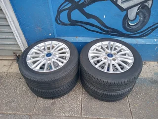 A Set of Rims And TYRES 15inche Ford Figo and Ford Fiesta Original mag 4X108 Pcd