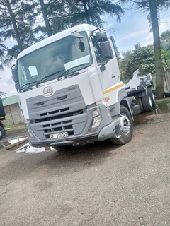 Nissan Quon with skip loader for sale