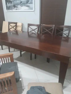 Coricraft dining table with six chairs