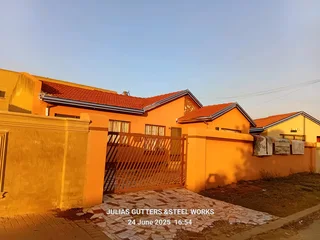 GUTTERS,PILLAR COVERING AND STEELWORKS
