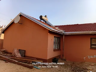 GUTTERS,PILLAR COVERING AND STEELWORKS