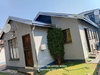 INSTALLATION OF ALL GUTTERS AND PILLAR COVERING