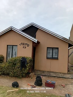 INSTALLATION OF ALL GUTTERS AND PILLAR COVERING