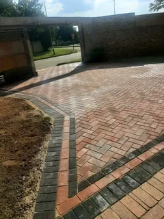 PAVING ROADS N DRIVEWAYS