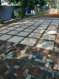 PAVING ROADS N DRIVEWAYS