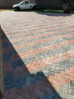 PAVING ROADS N DRIVEWAYS