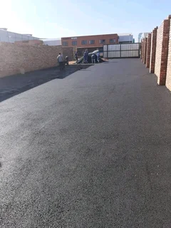 PAVING ROADS N DRIVEWAYS