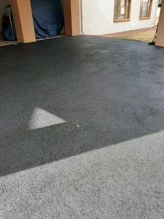 PAVING ROADS N DRIVEWAYS