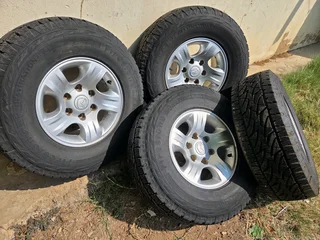 Mazda mags size 15 with tyres 90% set