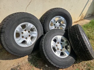 Mazda mags size 15 with tyres 90% set