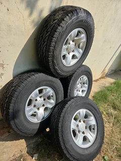 Mazda mags size 15 with tyres 90% set