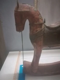 Buy this wood and brass rocking horse and support our hAnsycapped