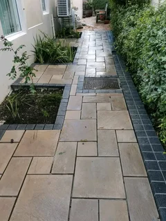 Rockface Paving Slabs And Artificial Grass