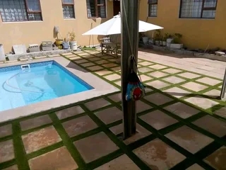 ROCKFACE PAVING SLABS AND ARTIFICIAL GRASS