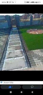 ROCKFACE PAVING SLABS AND ARTIFICIAL GRASS