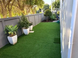 ROCKFACE PAVING SLABS AND ARTIFICIAL GRASS