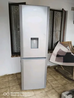 Defy fridge freezer with water dispenser R2950