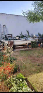 R16k. Dory Bass boat on trailer. 60 hp Suzuki outboard. Call Anjé 071 296 1465